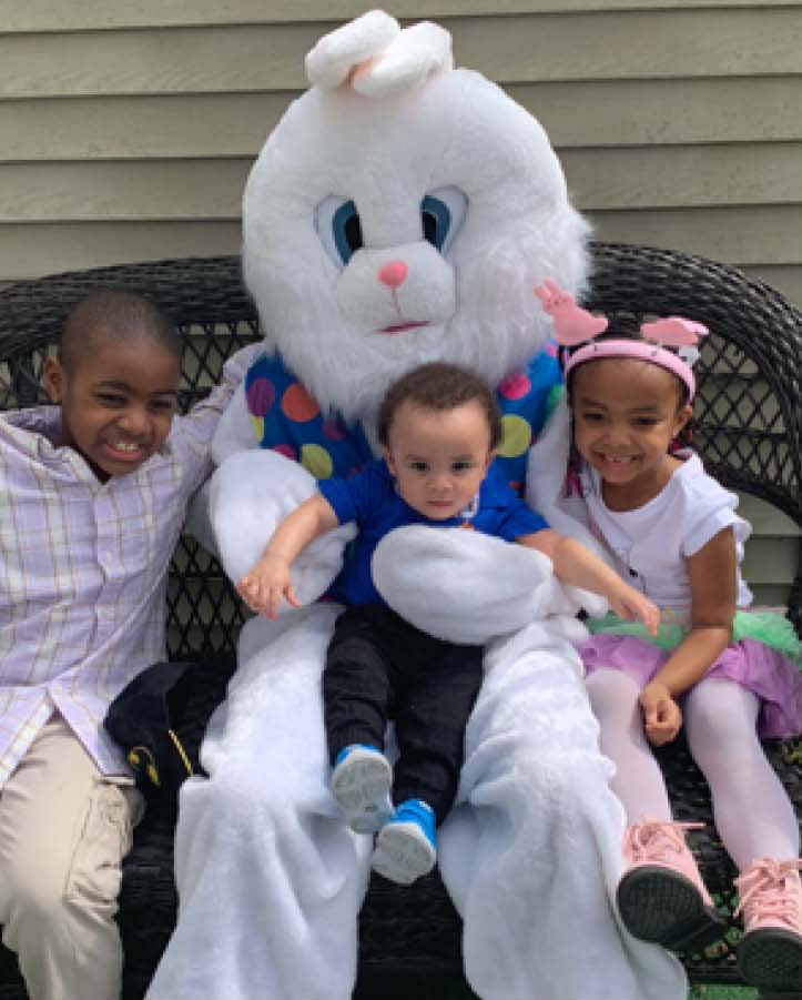 3 children with Easter Bunny